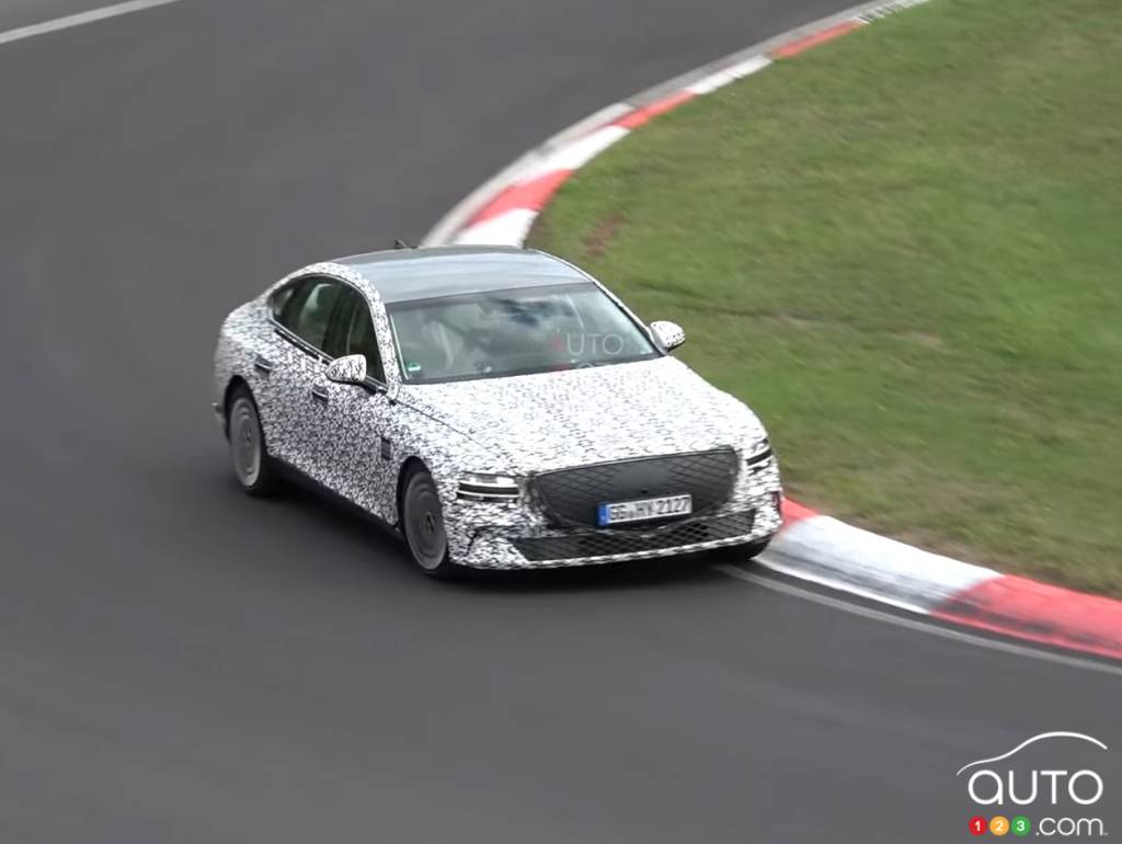 An electric-powered Genesis G80 in testing on the track at Nürburgring